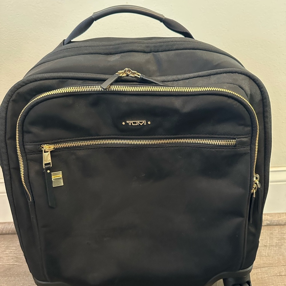 Tumi Black Backpack with Professional Design and Smooth Finish